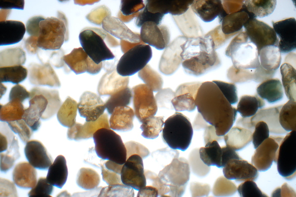 Figure 2: Gravel: This close up shows that all of the grains of sand are nearly the same size. This allows for air space in the gaps. This rock would have high porosity [2].