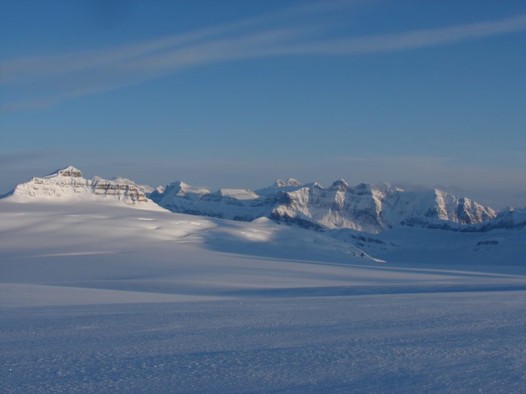 Photograph across the Columbia icefields with mountain peaks in the distance.