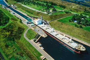 Photograph looking down on a ship passing through one of the St Lawrence Seaway locks