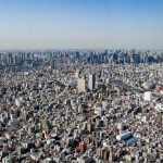 A daytime photograph of the urban sprawl of Tokyo.